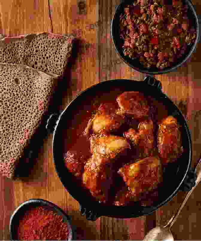 An Authentic Ethiopian Chicken Curry, Featuring Tender Chicken Cooked In A Spicy Berbere Sauce, Served With Injera Bread Best Recipes Of Cooking Chicken Curry: Chicken Curry Recipes From Different Countries